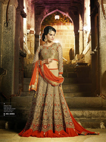Gold With Orange Heavy Embroidery Work Party Wear Lehenga Choli