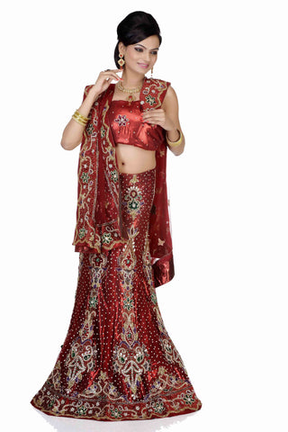 Grand Maroon Color Net Garnished With Heavy Antique Embroidery Lehenga Choli