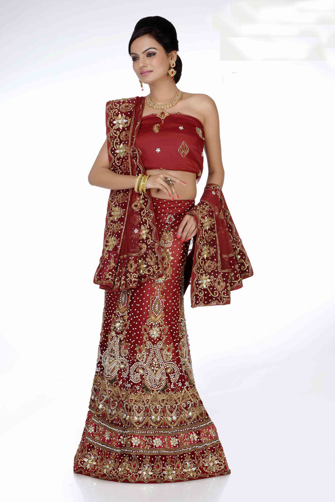 Seductive Maroon Net With Heavy Stone Work Bridal Lehenga Choli