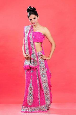 Gorgeous Pink Net With Heavy Stone Work Lehenga Choli