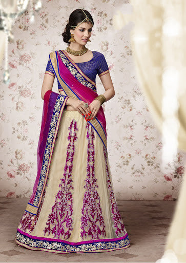 THE TEMPTRESS WEARING THIS CREAM AND RANI LEHENGA 