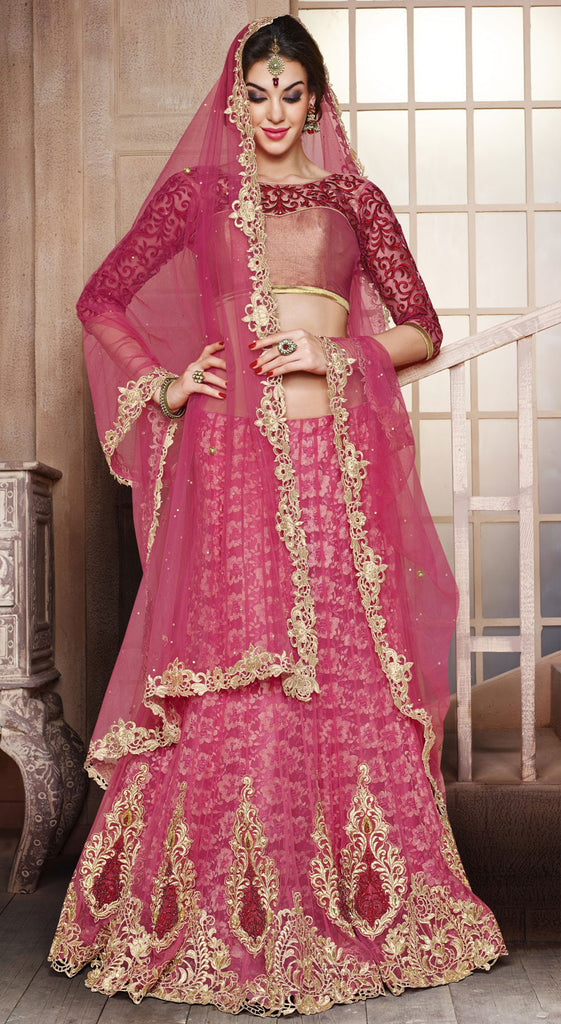 Queenly designed lehenga choli with artistic embroidery and designer blouse