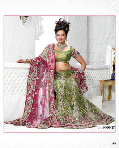 Green Net Bridal Lehenga comes with attractive  stone work
