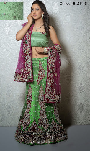 Regal Green And Purple Net With Stone Work Lehenga Choli 