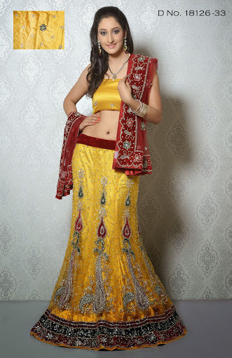 Yellow Color Net With Heavy Stone Work Bridal Lehenga Choli
