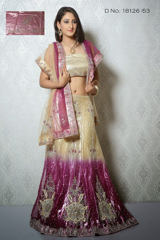 Cream And Magenta Color Net With Stone Work Lehenga Choli